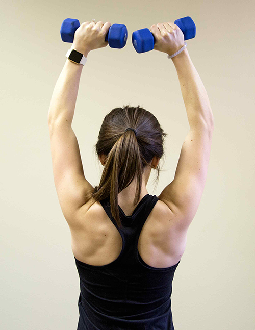 Alexis - Dumbbell overhead press (proper form)