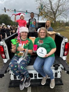 Women at the Zachary Parade - holiday attractions to attend in Louisiana.